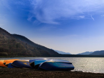 Lake Ashi with canoes laying on the ground