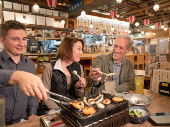 Tokyo's locals have fun with the travelers in the resta Tokyo's locals have fun with the travelers in the resta