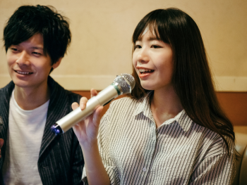 Japanese people singing karaoke Japanese people singing karaoke