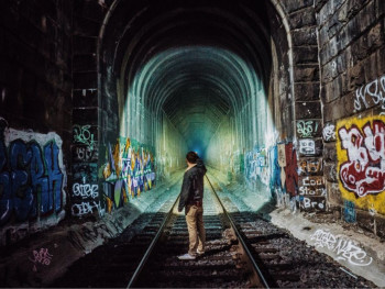 Street artists have turned the abandoned tracks into a Street artists have turned the abandoned tracks into a