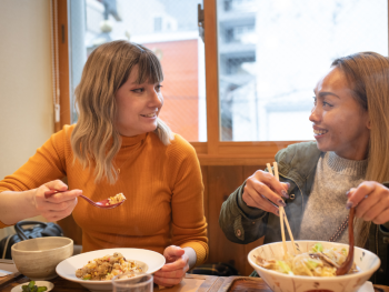 Women enjoying ramen in Tokyo Women enjoying ramen in Tokyo