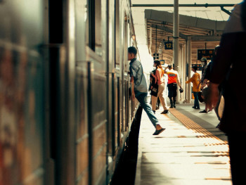 Local train platform at sunset with passengers waiting and warm golden light. Photo by Muhammad Al Bazzar on Pexels. Local train platform at sunset with passengers waiting and warm golden light. Photo by Muhammad Al Bazzar on Pexels.
