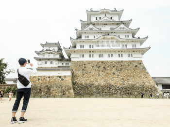 Himeji Castle in morning light with traditional landscape. Himeji Castle in morning light with traditional landscape.
