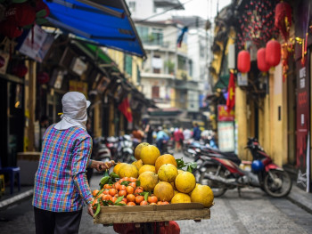 Small rural day market with traditional craft and food vendors. Image by Ngo Tuan Anh from Pixabay