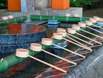 Purification fountain with bamboo ladles Photo by Nana Fuzimi on Unsplash Purification fountain with bamboo ladles Photo by Nana Fuzimi on Unsplash