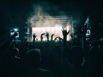 Performers on stage at Club Naniwa during a Taishu Engeki show with colorful costumes and dramatic lighting.Image by Okan Caliskan from Pixabay