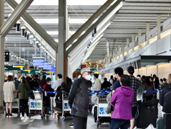 Welcome scene at Osaka train station or airport with travelers arriving, luggage in hand, looking excited about their upcoming adventure Photo by Charles Gao on Unsplash Welcome scene at Osaka train station or airport with travelers arriving, luggage in hand, looking excited about their upcoming adventure Photo by Charles Gao on Unsplash