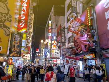 Shoppers walking through Namba covered arcade Shoppers walking through Namba covered arcade
