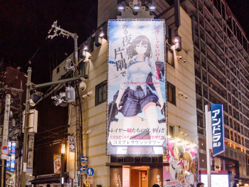 Busy Dotonbori street scene showing typical tourist crowds during peak season Busy Dotonbori street scene showing typical tourist crowds during peak season