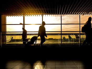 Travelers with luggage being greeted at Kansai International Airport Image by Rudy and Peter Skitterians from Pixabay Travelers with luggage being greeted at Kansai International Airport Image by Rudy and Peter Skitterians from Pixabay
