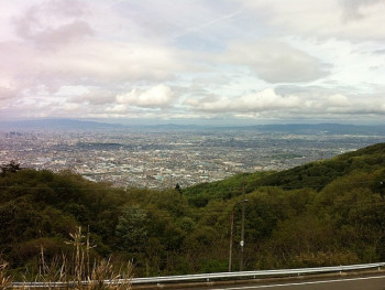 A panoramic view from Mount Ikoma showing Osaka's skyline in the distance framed by green mountains photo by comachiangel Creative Commons Attribution 3.0 A panoramic view from Mount Ikoma showing Osaka's skyline in the distance framed by green mountains photo by comachiangel Creative Commons Attribution 3.0