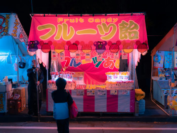 Neon-lit food stalls and colorful signage under the Osaka night sky Photo by mos design on Unsplash Neon-lit food stalls and colorful signage under the Osaka night sky Photo by mos design on Unsplash