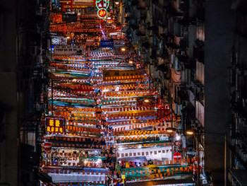 A panoramic view of a bustling Osaka night market from above. Photo by Grant Czerwinski on Unsplash