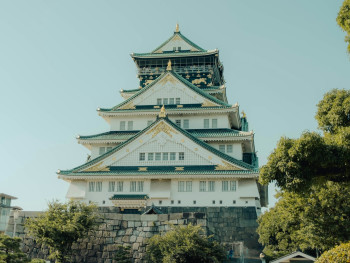 Osaka Castle exterior with tourists taking photos Photo by Elias Neumann on Unsplash Osaka Castle exterior with tourists taking photos Photo by Elias Neumann on Unsplash
