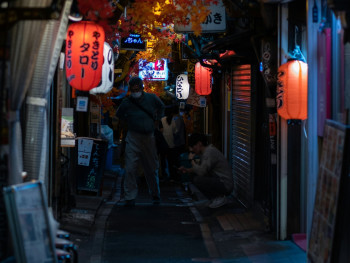 Narrow alley in Shinsekai at night with small street food stalls and local customers Photo by Raphael Lopes on Unsplash Narrow alley in Shinsekai at night with small street food stalls and local customers Photo by Raphael Lopes on Unsplash