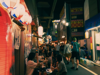 Strangers becoming friends while sharing a meal at a communal food stall Photo by ayumi kubo on Unsplash Strangers becoming friends while sharing a meal at a communal food stall Photo by ayumi kubo on Unsplash