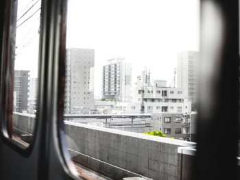 Inside view of a JR Loop Line train with Osaka cityscape visible. Photo by Charles Postiaux on pexels Inside view of a JR Loop Line train with Osaka cityscape visible. Photo by Charles Postiaux on pexels