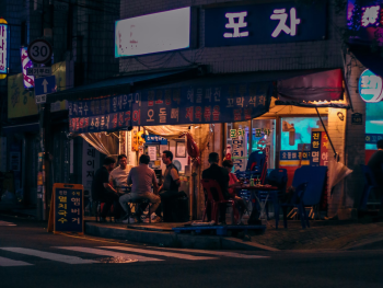 Locals outside restaurant. Photo by Le Thanh Huyen on Unsplash Locals outside restaurant. Photo by Le Thanh Huyen on Unsplash
