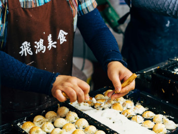Traditional takoyaki vendor preparing food in Namba Photo by Markus Winkler Pexels Traditional takoyaki vendor preparing food in Namba Photo by Markus Winkler Pexels