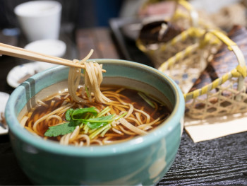 Udon noodle specialist preparing fresh noodles.