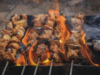 Wagyu beef skewers being grilled over charcoal with visible flames and smoke Photo by Samer Daboul on pexels Wagyu beef skewers being grilled over charcoal with visible flames and smoke Photo by Samer Daboul on pexels