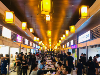 Bustling department store basement food court with various food stalls and seated dining areas Photo by Russel Jhon Seares on Unsplash Bustling department store basement food court with various food stalls and seated dining areas Photo by Russel Jhon Seares on Unsplash