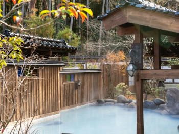 An open air bath with hot spring water steaming in the cold winter air, surrounded by natural stone and traditional Japanese design Photo by Kouji Tsuru on Unsplash An open air bath with hot spring water steaming in the cold winter air, surrounded by natural stone and traditional Japanese design Photo by Kouji Tsuru on Unsplash