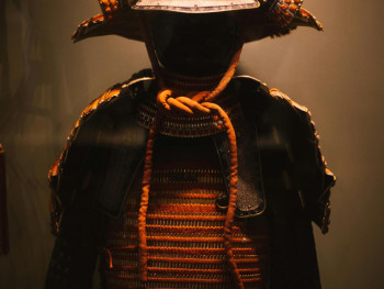 Interior museum display showing traditional samurai armor and weapons against modern display cases. Photo by Arseni Shuliak on pexelsels Interior museum display showing traditional samurai armor and weapons against modern display cases. Photo by Arseni Shuliak on pexelsels