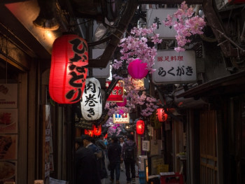 A lantern-lit dining alley at night A lantern-lit dining alley at night