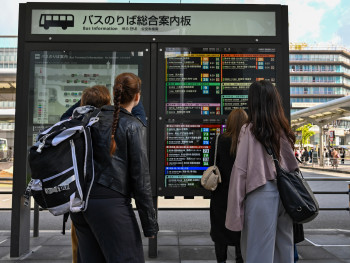Tourists on their first visit to Kyoto. Tourists on their first visit to Kyoto.