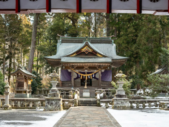 Snow-dusted Kyoto temple courtyard in winter, showing the quiet beauty of traditional Japanese architecture. Snow-dusted Kyoto temple courtyard in winter, showing the quiet beauty of traditional Japanese architecture.