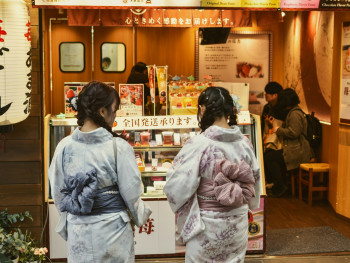 Host introducing guests to traditional Japanese sweets at a local Kyoto confectionery shop. Image by Mircea Solomiea on Unsplash. Host introducing guests to traditional Japanese sweets at a local Kyoto confectionery shop. Image by Mircea Solomiea on Unsplash.