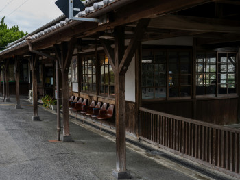 Local train station platform with commuters and traditional architecture visible Photo by Kouji Tsuru on Unsplash Local train station platform with commuters and traditional architecture visible Photo by Kouji Tsuru on Unsplash