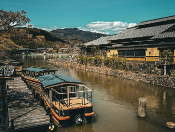 Historic buildings reflected in the calm waters of Uji River. Photo by Apollo on Unsplash Historic buildings reflected in the calm waters of Uji River. Photo by Apollo on Unsplash