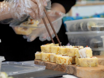 Fresh sushi being prepared at Tsukiji market stall. Photo by Namito Yokota on Unsplash Fresh sushi being prepared at Tsukiji market stall. Photo by Namito Yokota on Unsplash