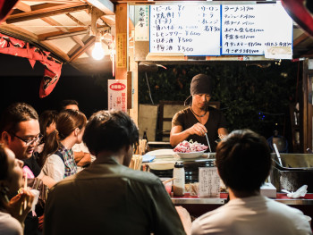 Food stalls with glowing lanterns.Photo by HANVIN CHEONG on Unsplash Food stalls with glowing lanterns.Photo by HANVIN CHEONG on Unsplash