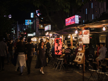 Festival street food stalls with crowds of people sampling various dishes. Photo by Aoi on Unsplash Festival street food stalls with crowds of people sampling various dishes. Photo by Aoi on Unsplash