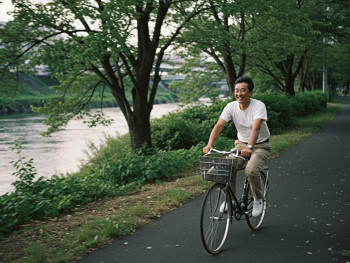 Cycling along the river Cycling along the river