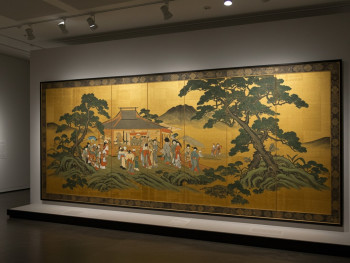 Traditional Japanese artwork displayed in a museum setting. Traditional Japanese artwork displayed in a museum setting.