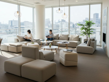 Common area in a modern capsule hotel with comfortable seating. Common area in a modern capsule hotel with comfortable seating.