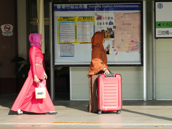 Travelers with light luggage walking past map at Shin-Osaka Photo by Arthur Tseng on Unsplash Travelers with light luggage walking past map at Shin-Osaka Photo by Arthur Tseng on Unsplash