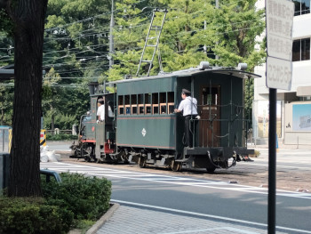 Quiet moment with train passing behind local street Photo by Mak on Unsplash Quiet moment with train passing behind local street Photo by Mak on Unsplash