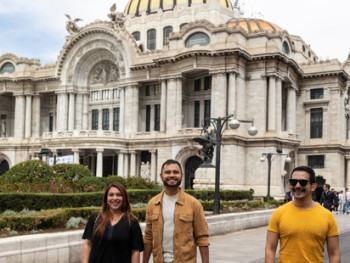 City Unscripted host and guests walking in front of Palacio de Bellas Artes City Unscripted host and guests walking in front of Palacio de Bellas Artes