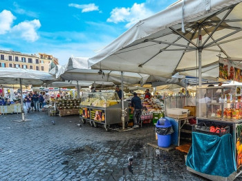Placeholder - Morning bustle at Mercato Testaccio with locals buying fresh pasta, vegetables, and seasonal produce Placeholder - Morning bustle at Mercato Testaccio with locals buying fresh pasta, vegetables, and seasonal produce