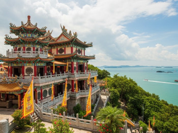 Colorful Chinese temple on Kusu Island hilltop with sea views. Colorful Chinese temple on Kusu Island hilltop with sea views.