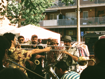 Crowded pedestrian boulevard with street musicians Crowded pedestrian boulevard with street musicians