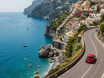 Scenic coastal road winding along the Amalfi Coast with a rental car at a viewing point Scenic coastal road winding along the Amalfi Coast with a rental car at a viewing point