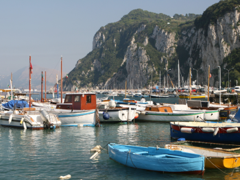 Colorful fishing boats floating peacefully in Marina Grande harbor Colorful fishing boats floating peacefully in Marina Grande harbor