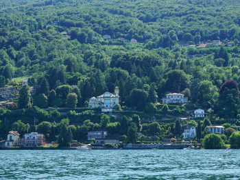 Monte Isola ferry and lakeside village with green hills Photo by Babak Habibi on Unsplash Monte Isola ferry and lakeside village with green hills Photo by Babak Habibi on Unsplash