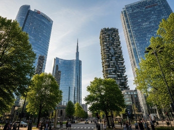 Modern skyscrapers in Porta Nuova with tree-lined streets below Modern skyscrapers in Porta Nuova with tree-lined streets below